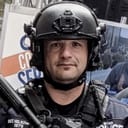 Adam C. Helschein